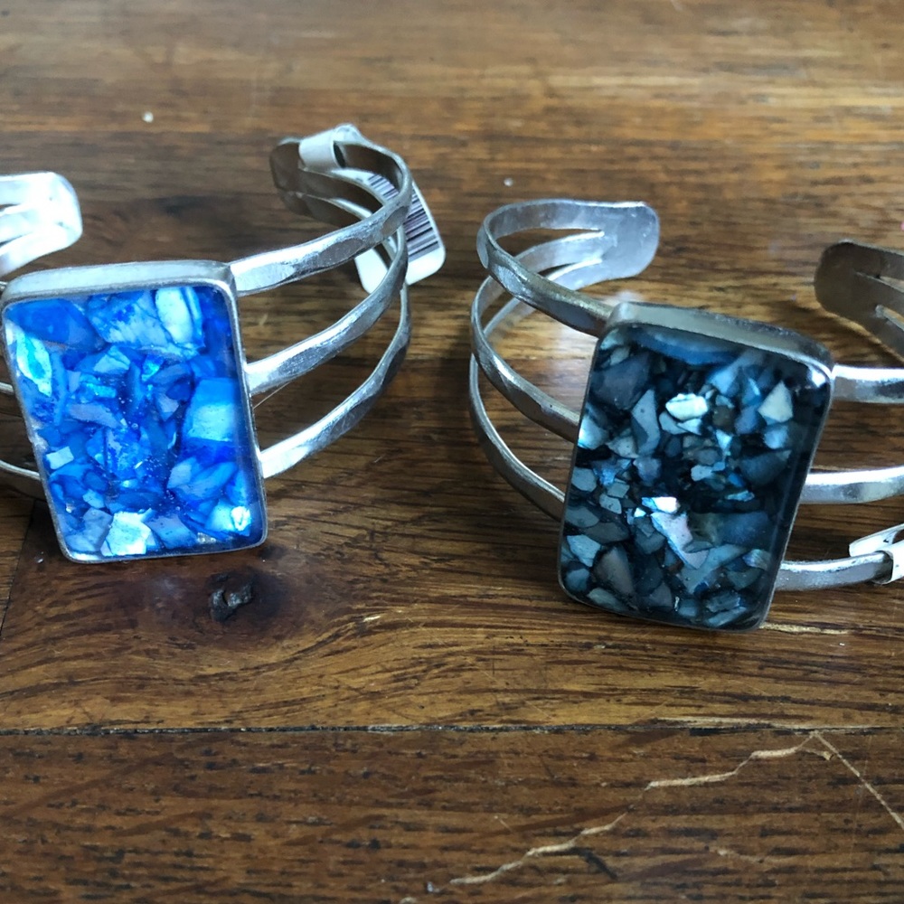 Matching bracelets with blue gems